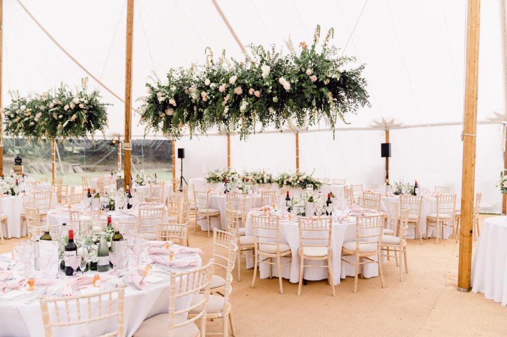 Lake District Marquee Wedding Flowers by Ewer-Roberts. Hanging floral installation
