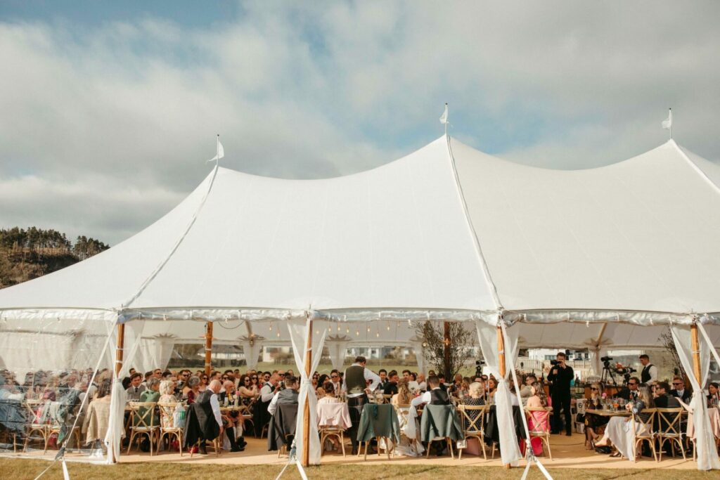 Sailcloth Tent Wedding with sides up - marquee wedding breakfast